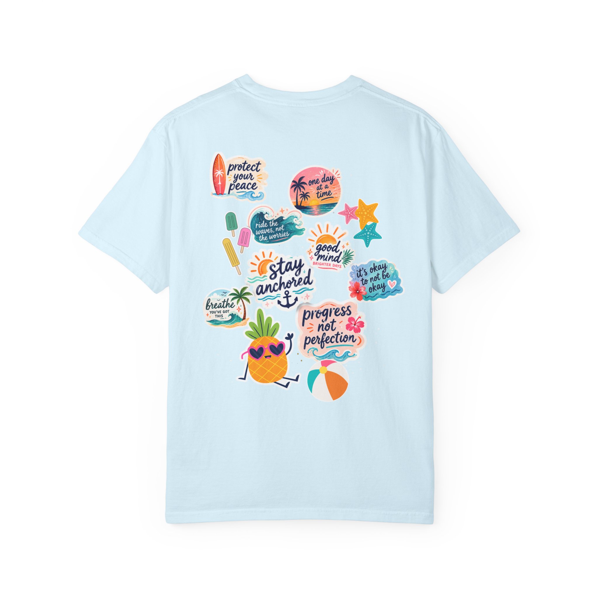 14445553865199022585_2048jpeg - Anchored Light blue T-shirt adorned with colorful beach-themed sticker decals on the back, including sun, palm trees, waves, and tropical icons.