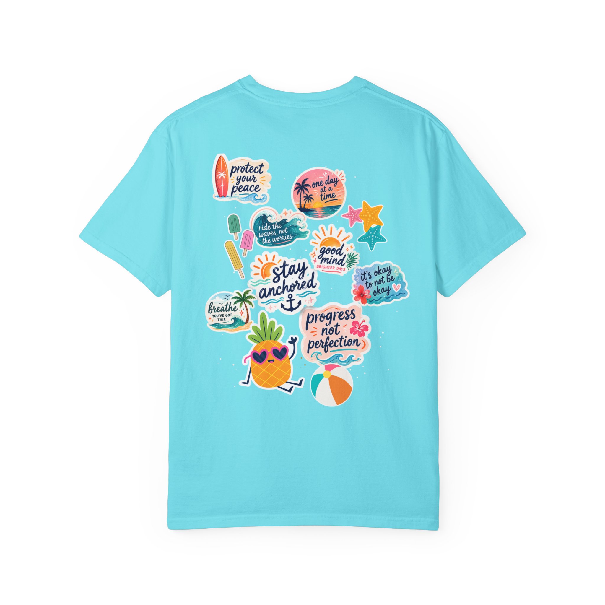 6517107457772660205_2048jpeg - Anchored Back view of a turquoise T-shirt covered with colorful sticker decals and tropical phrases like 'stay anchored' and 'good mind'.