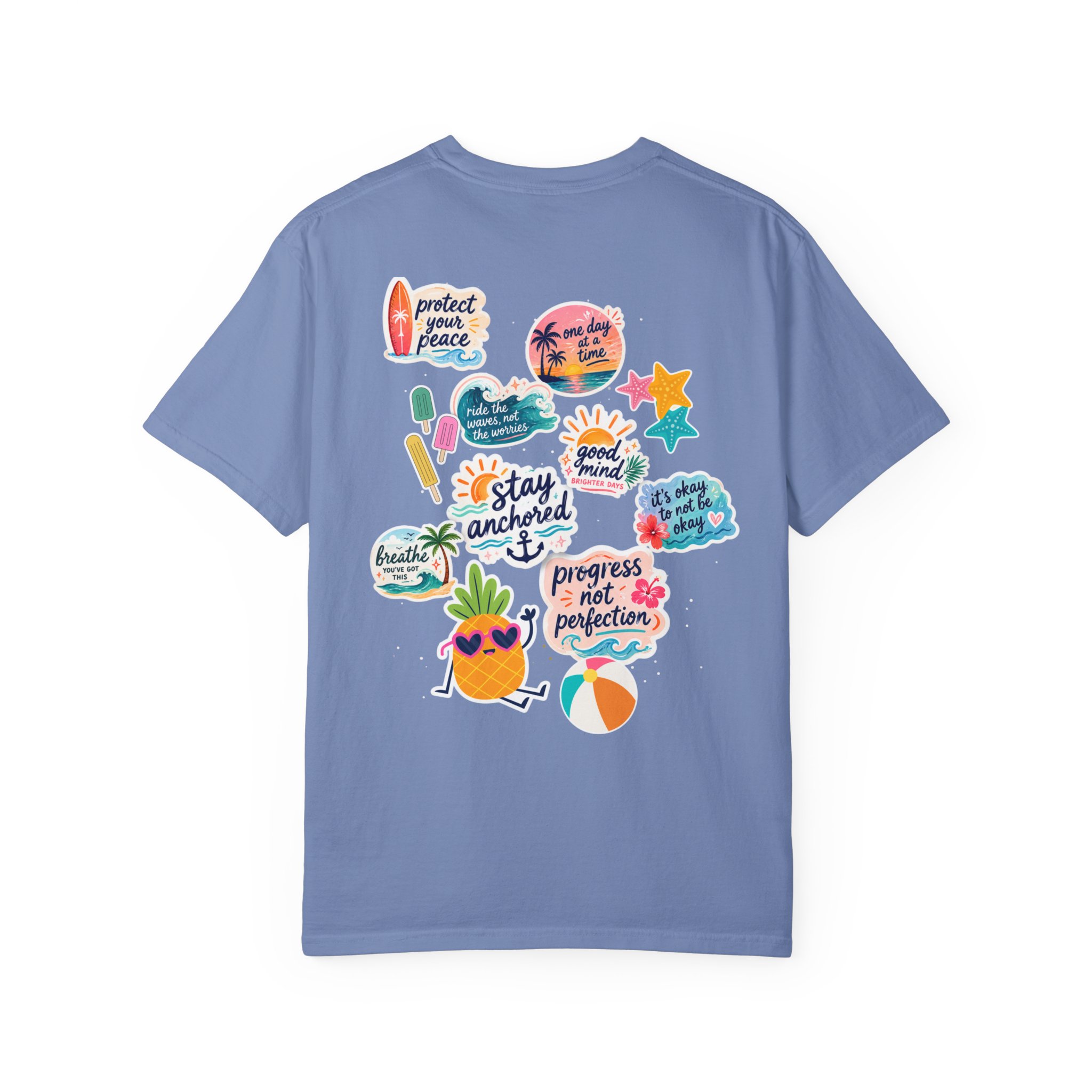 7895110443436295259_2048jpeg - Anchored Blue T-shirt covered with a colorful sticker collage including tropical icons and the phrase 'protect your peace.'